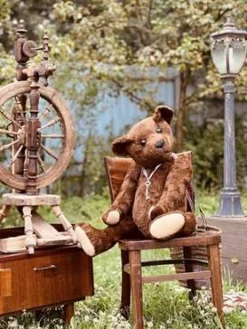 Teddy bear works on loom