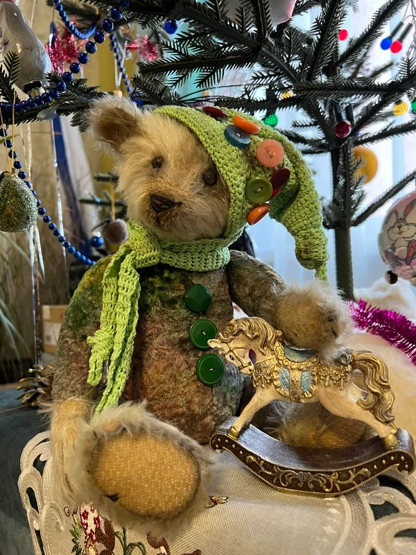handmade teddy critstmas bear under tree by julia perchits